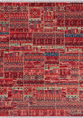 ANATOLIA-3802 handcrafted wool rug in red, burgundy, navy, cream with tribal patchwork styling
