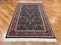 Hereke Yedidagin Cicegi Patterned Navy Handwoven Rug by Camel Carpet