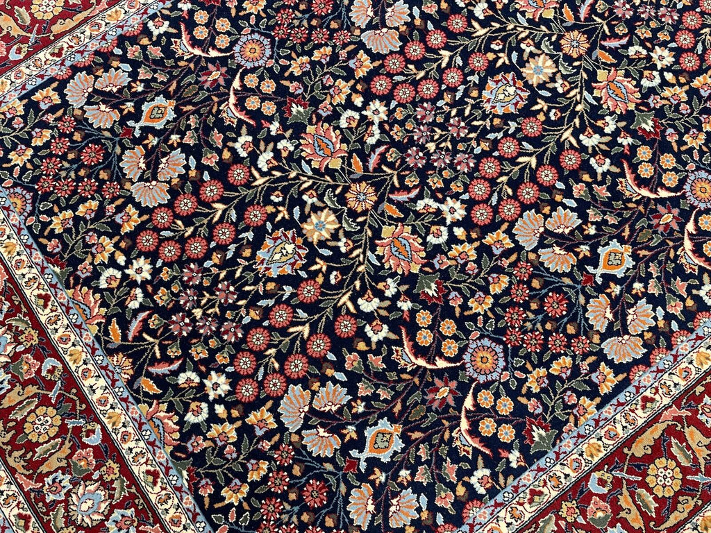 Hereke Yedidagin Cicegi Patterned Navy Handwoven Rug by Camel Carpet