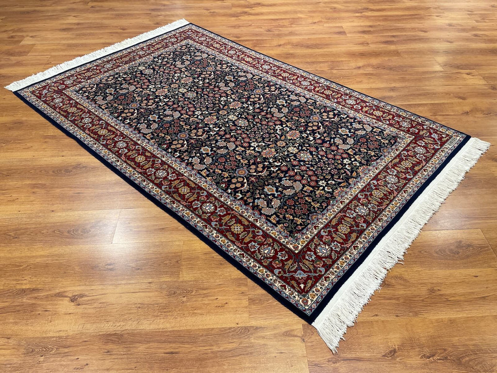 Hereke Yedidagin Cicegi Patterned Navy Handwoven Rug by Camel Carpet