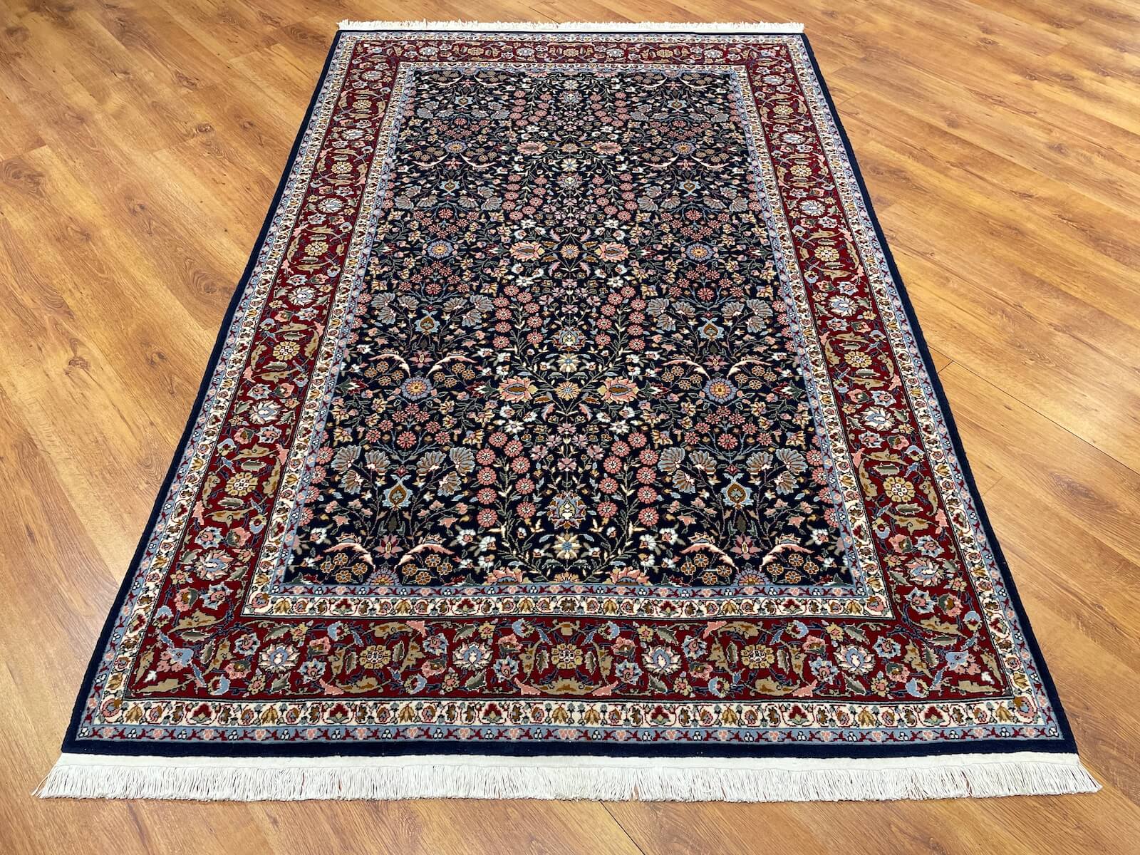 Hereke Yedidagin Cicegi Patterned Navy Handwoven Rug by Camel Carpet