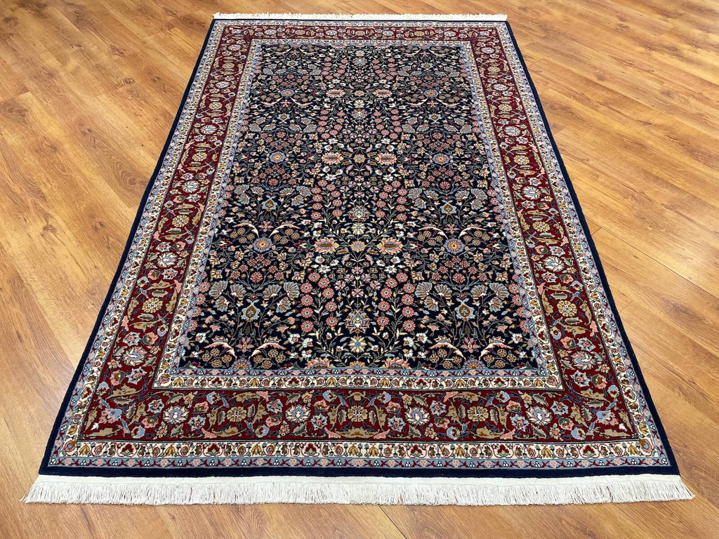 Hereke Yedidagin Cicegi Patterned Navy Handwoven Rug by Camel Carpet