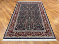Hereke Yedidagin Cicegi Patterned Navy Handwoven Rug by Camel Carpet