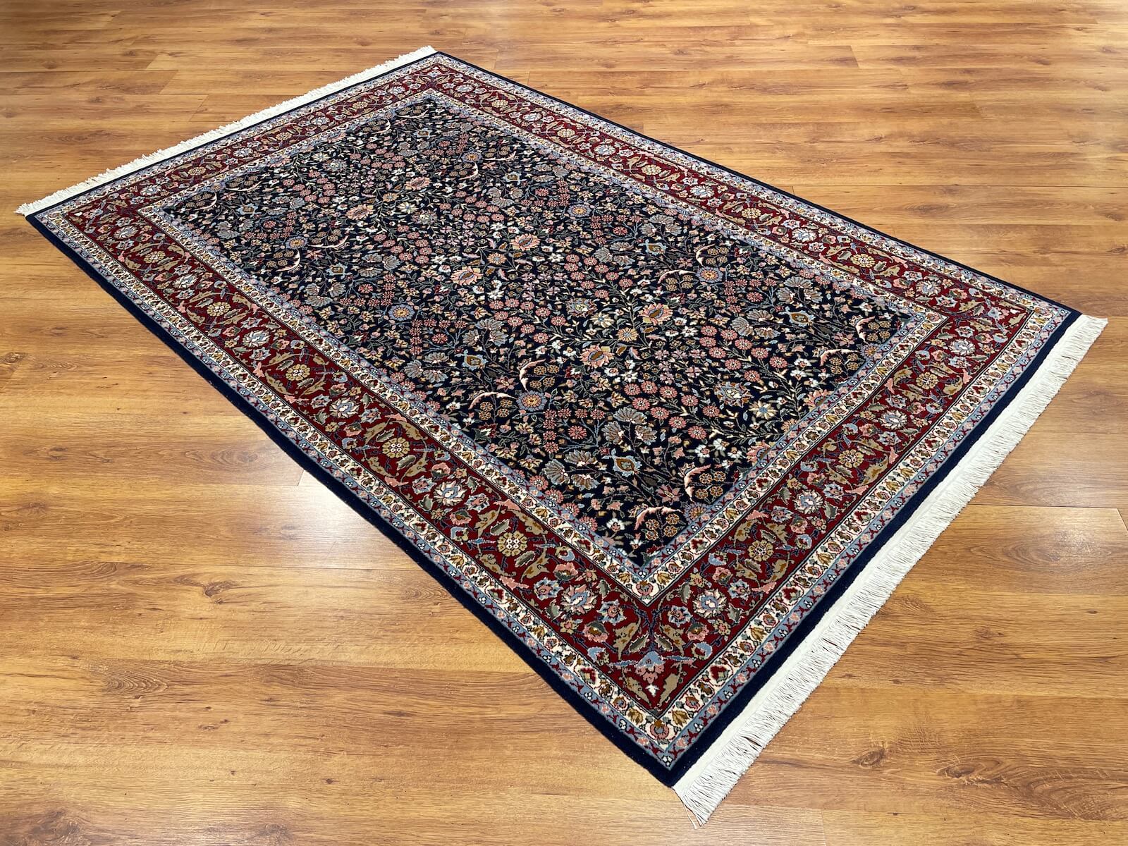 Hereke Yedidagin Cicegi Patterned Navy Handwoven Rug by Camel Carpet