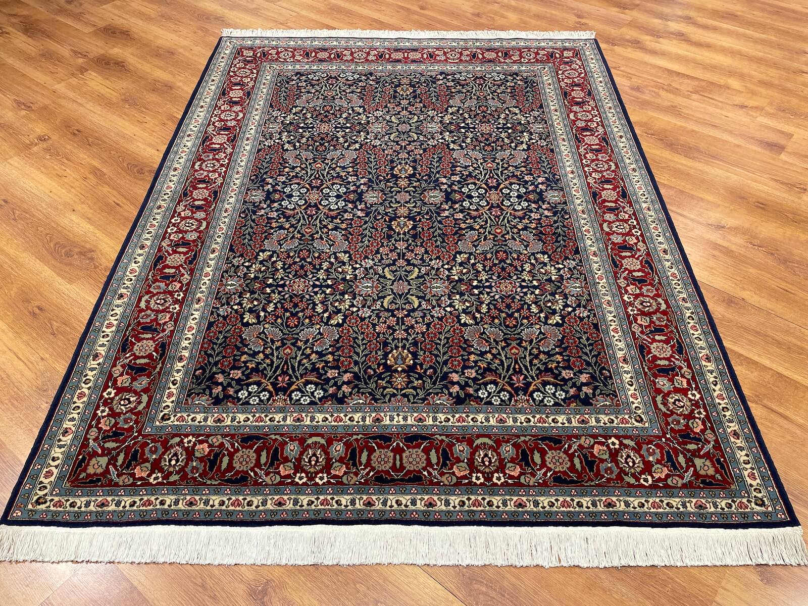 Hereke Yedidagin Cicegi Patterned Navy Handwoven Rug by Camel Carpet