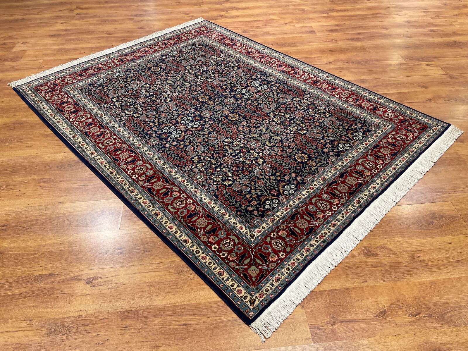 Hereke Yedidagin Cicegi Patterned Navy Handwoven Rug by Camel Carpet