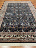 Hereke Yedidagin Cicegi Patterned Navy Handwoven Rug by Camel Carpet