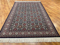 Hereke Kafkas Patterned Navy Handwoven Rug by Camel Carpet