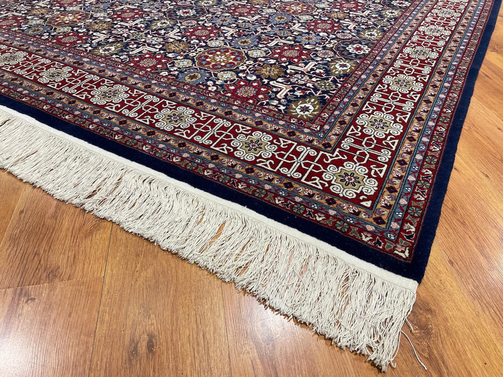 Hereke Kafkas Patterned Navy Handwoven Rug by Camel Carpet