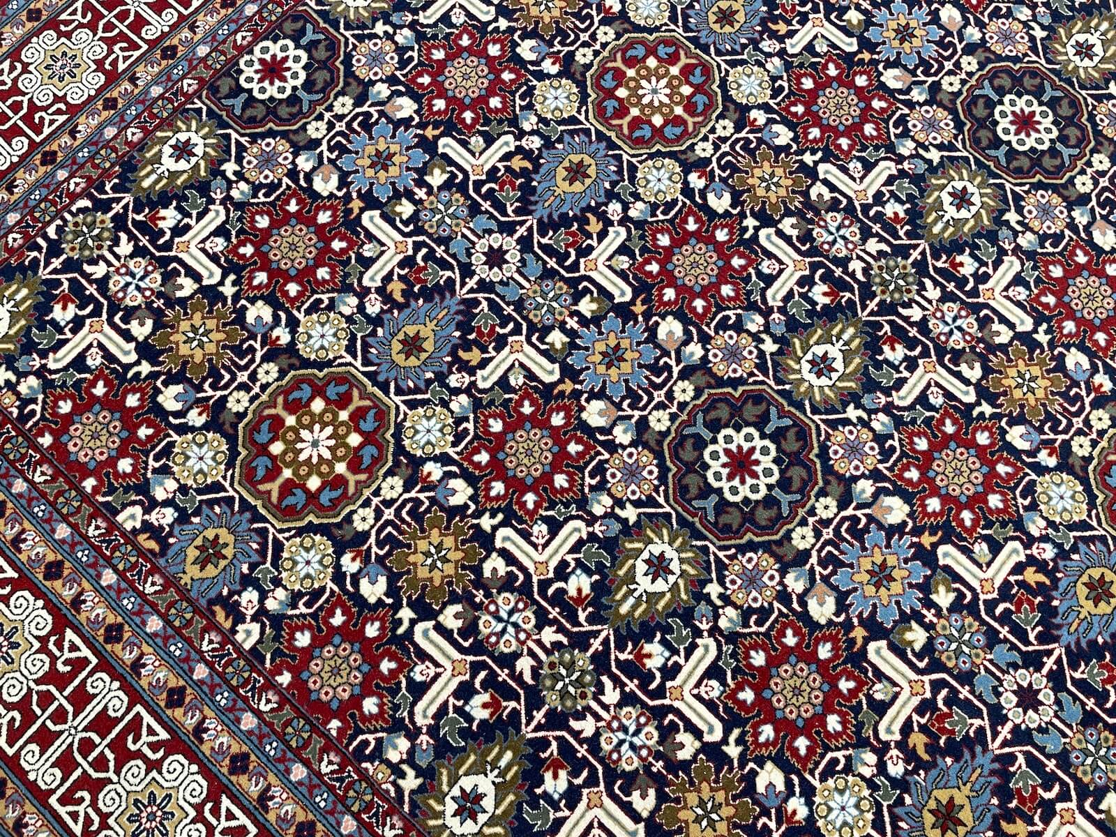 Hereke Kafkas Patterned Navy Handwoven Rug by Camel Carpet