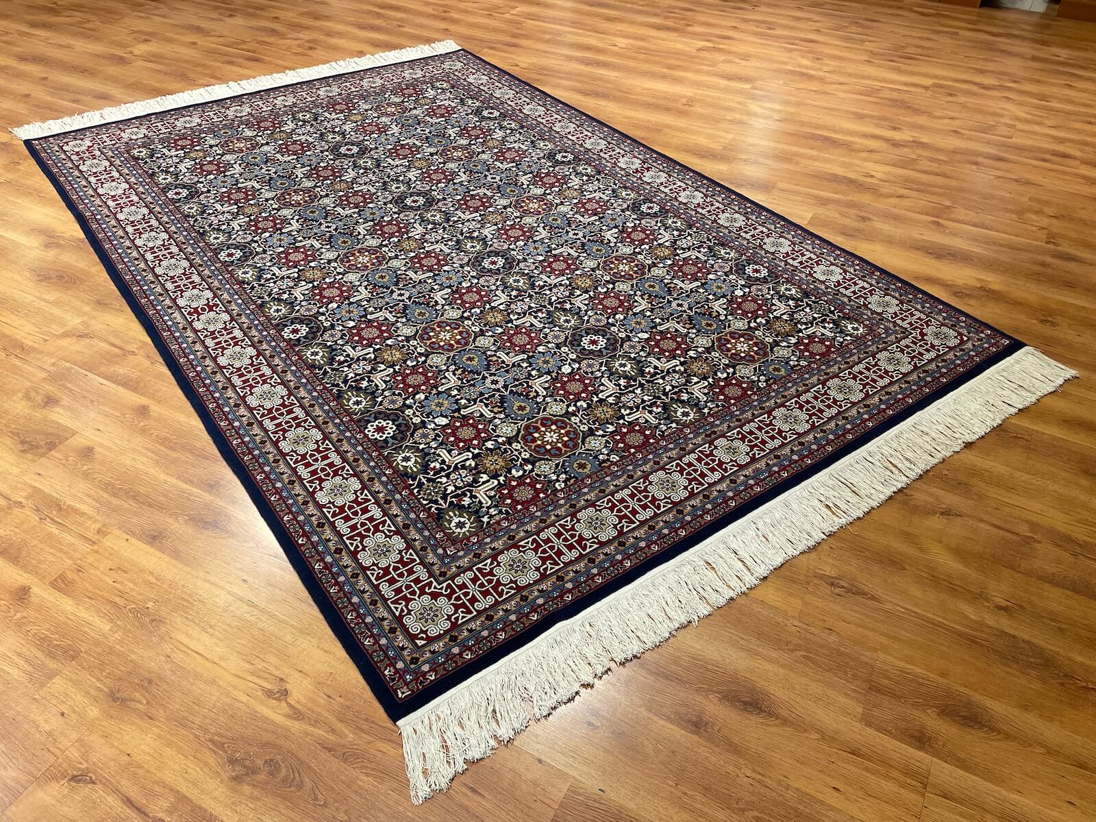 Hereke Kafkas Patterned Navy Handwoven Rug by Camel Carpet