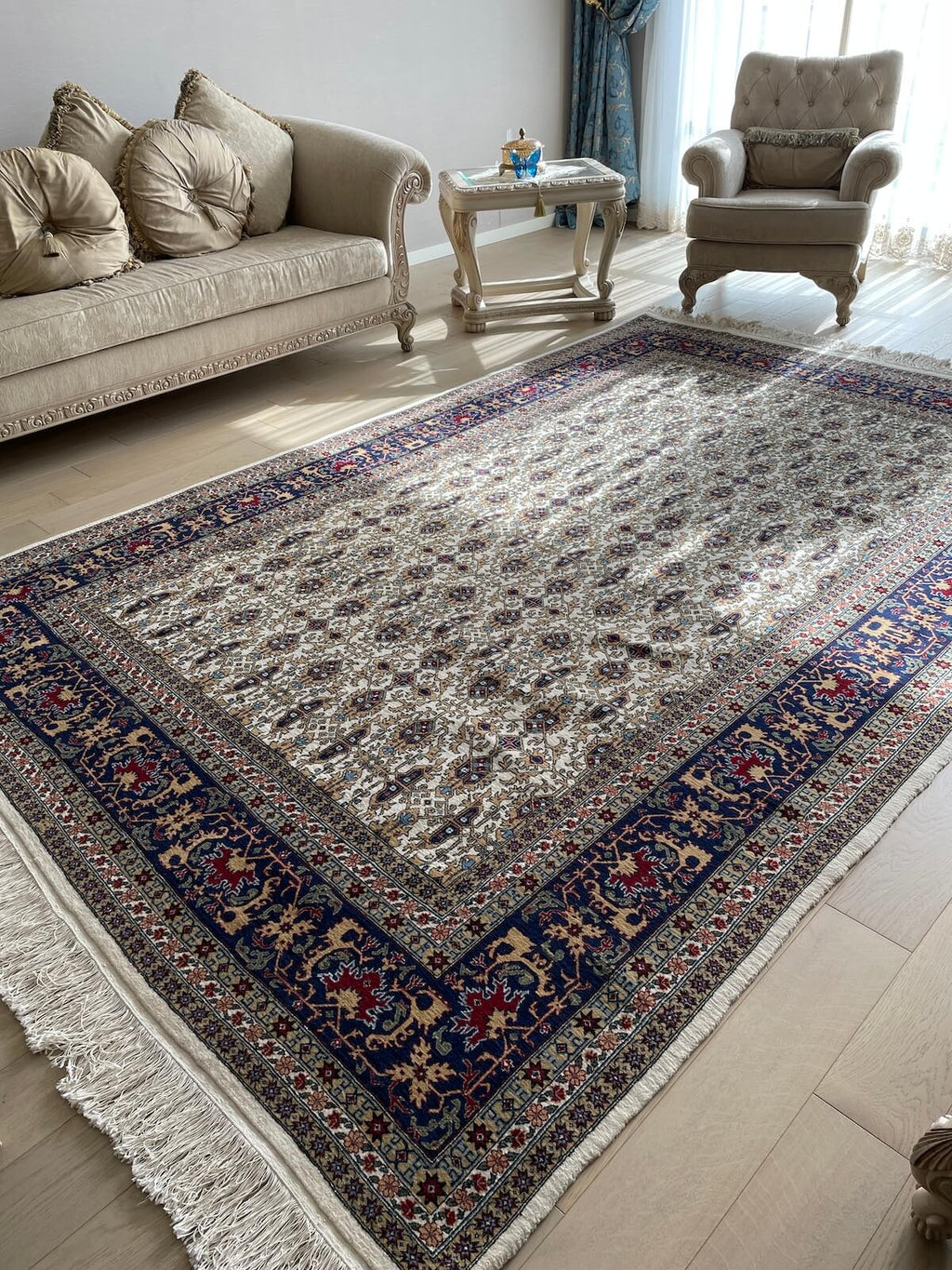 Hereke Cream Navy Handwoven Rug by Camel Carpet