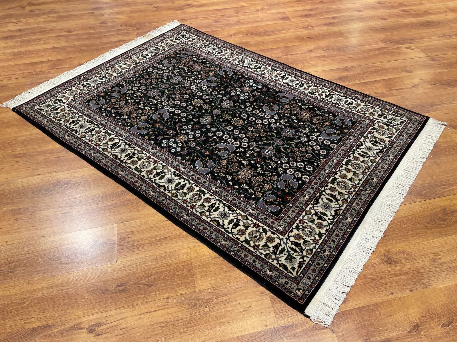 Hereke Yedidagin Cicegi Patterned Black Handwoven Rug by Camel Carpet