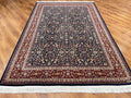 Hereke Yedidagin Cicegi Patterned Navy Handwoven Rug by Camel Carpet