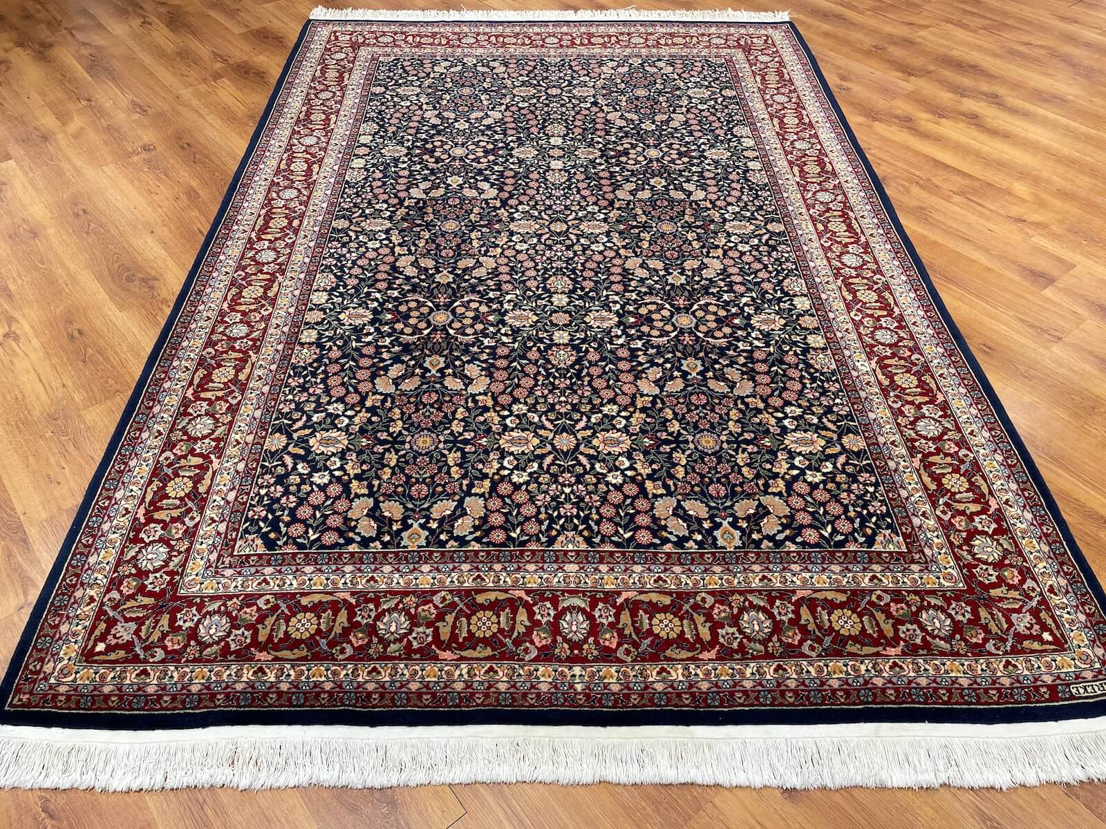 Hereke Yedidagin Cicegi Patterned Navy Handwoven Rug by Camel Carpet