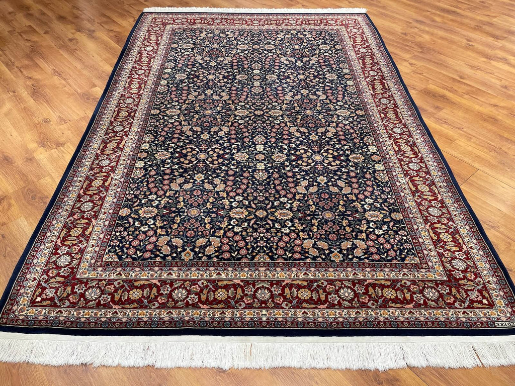 Hereke Yedidagin Cicegi Patterned Navy Handwoven Rug by Camel Carpet