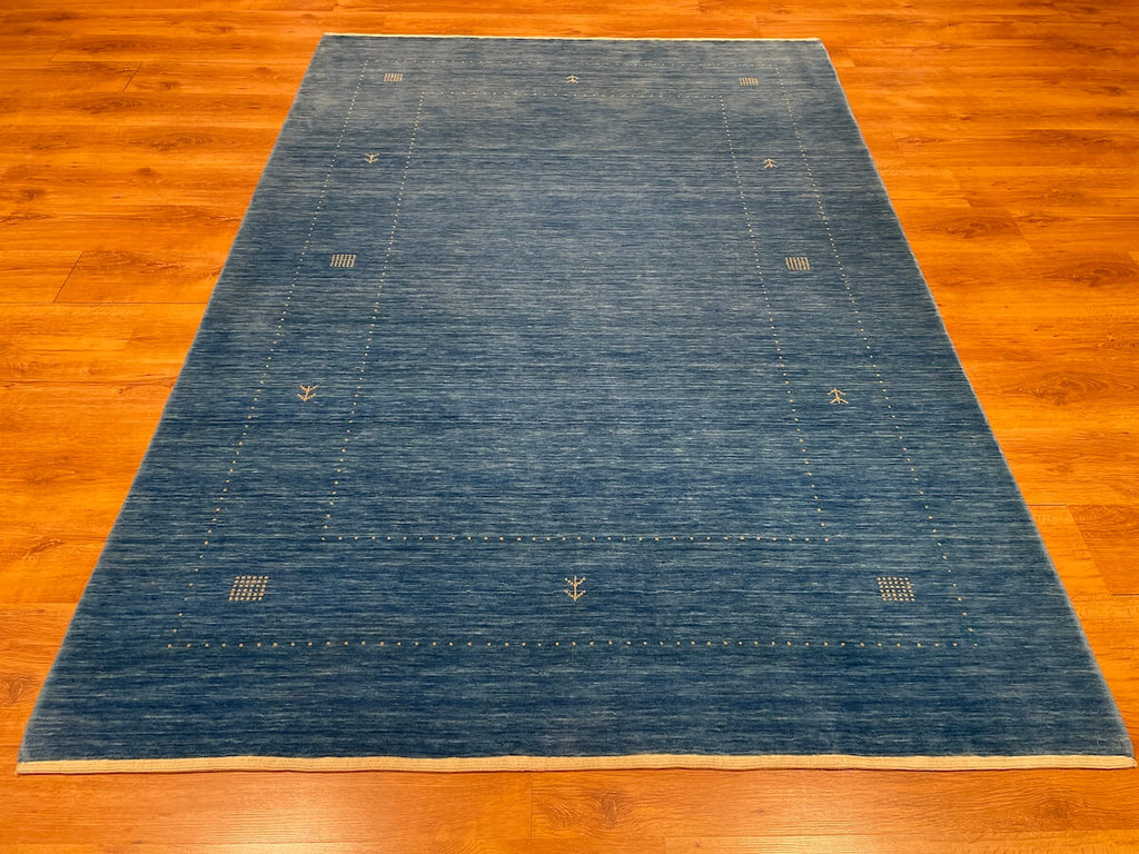 Lori Handwoven Blue Wool Rug – 170X240 by Camel Carpet