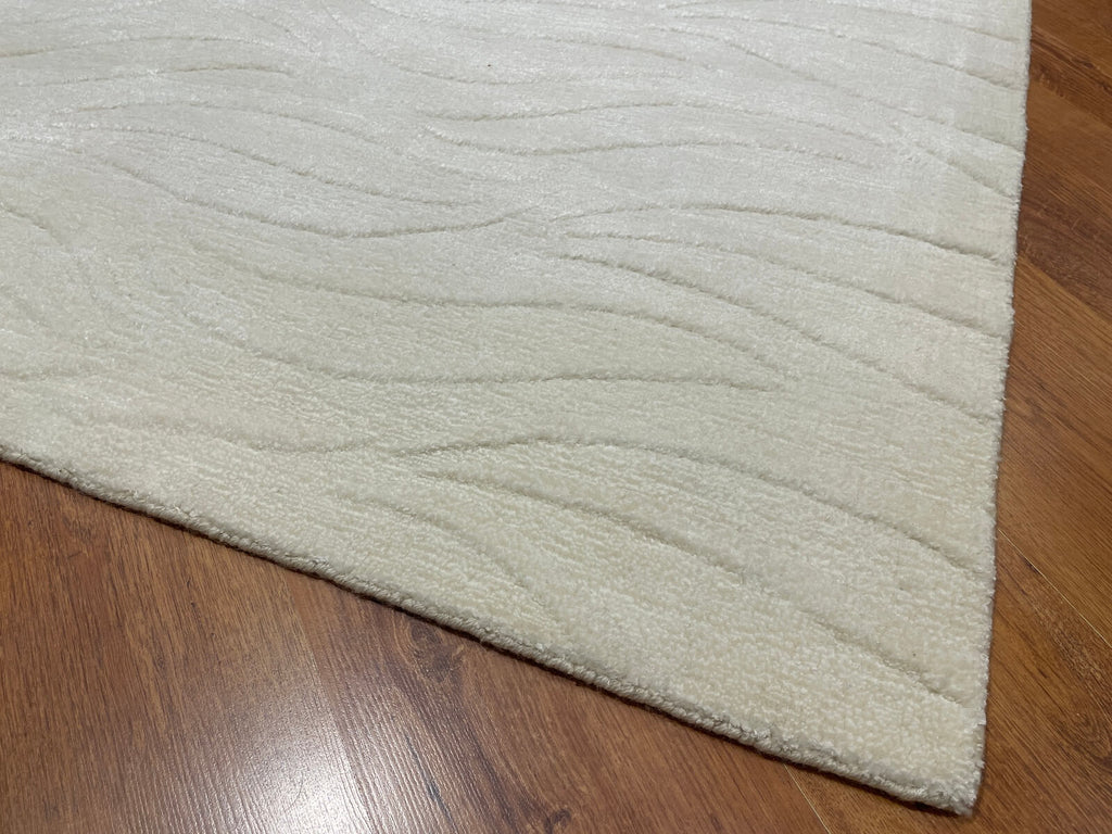 Lori Handwoven Cream Wool Rug by Camel Carpet