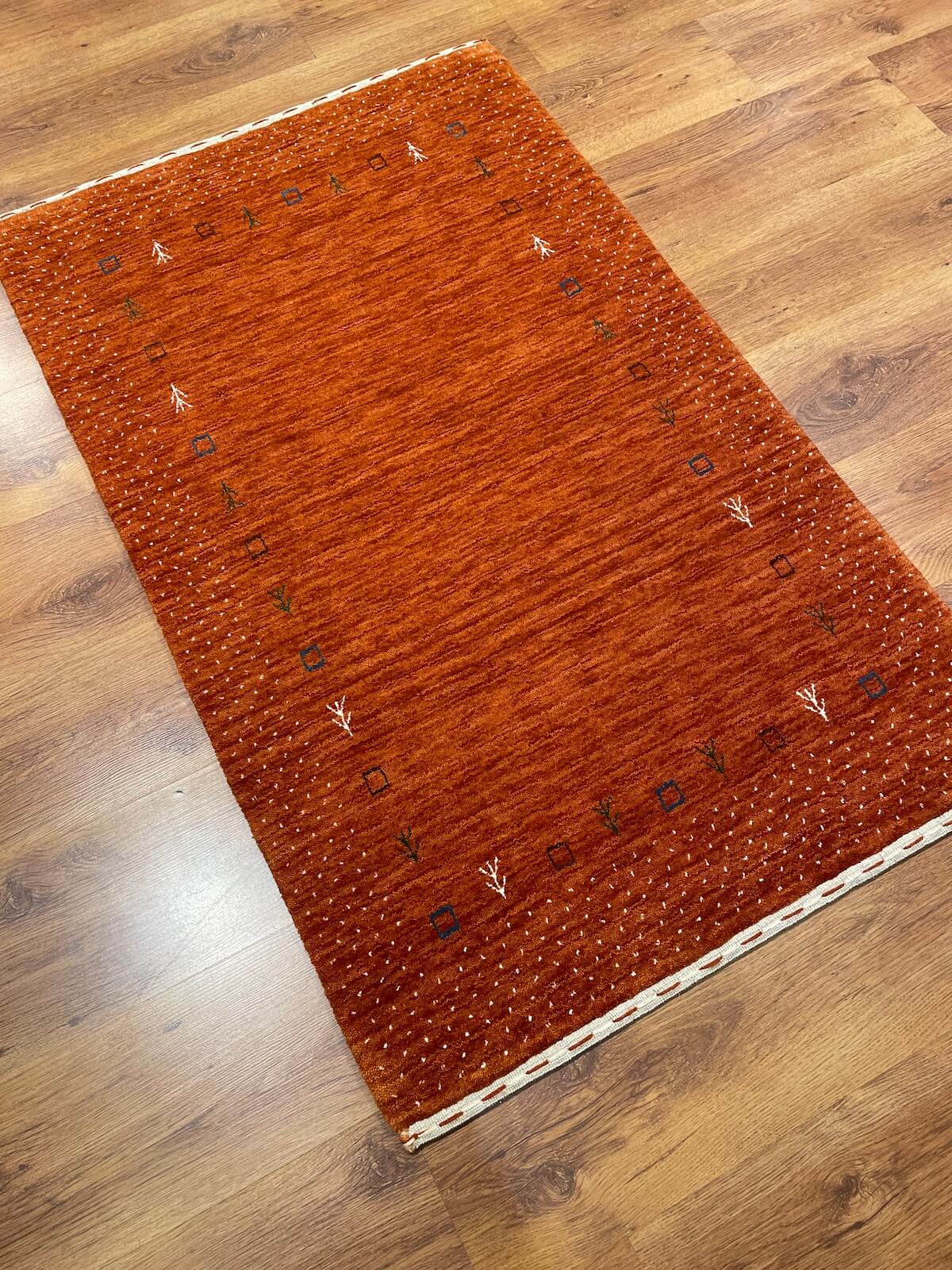 Lori Handwoven Orange Wool Rug by Camel Carpet