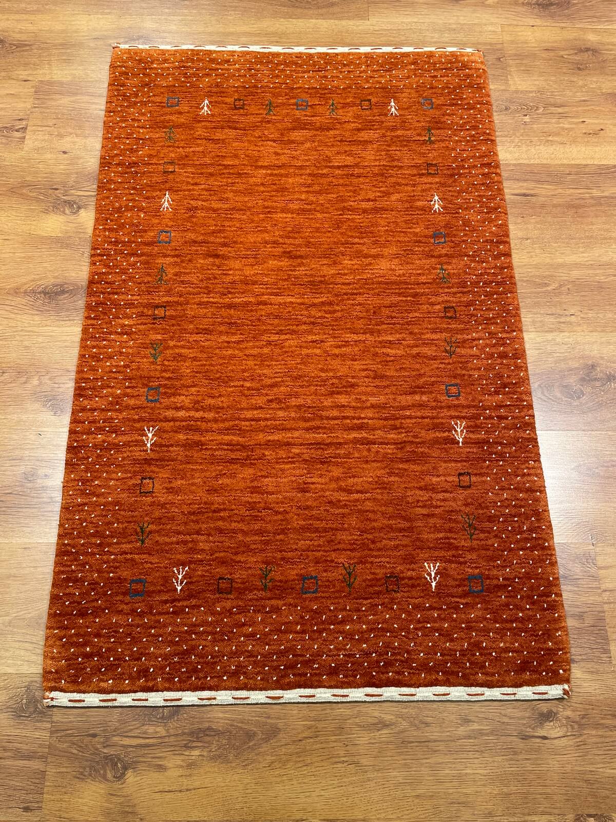 Lori Handwoven Orange Wool Rug by Camel Carpet