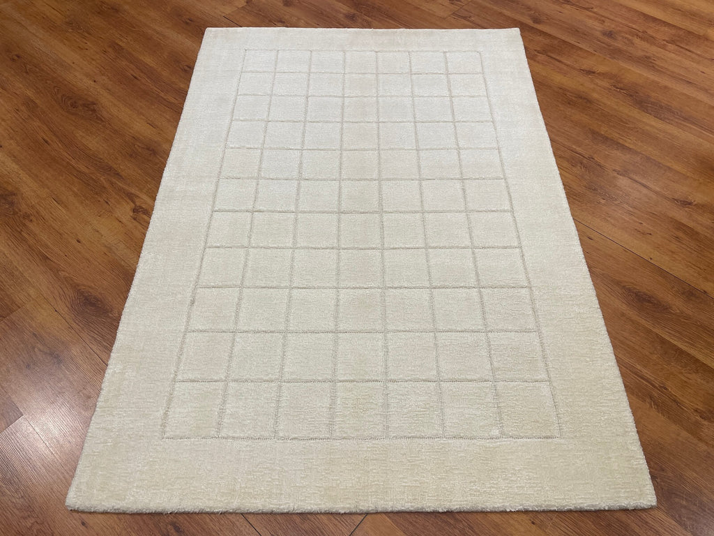 Lori Handwoven Cream Wool Rug by Camel Carpet