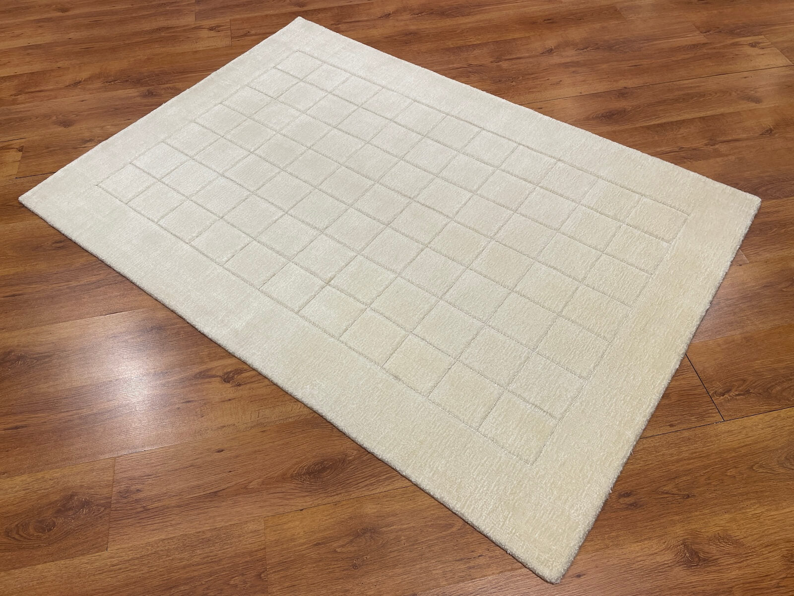 Lori Handwoven Cream Wool Rug by Camel Carpet