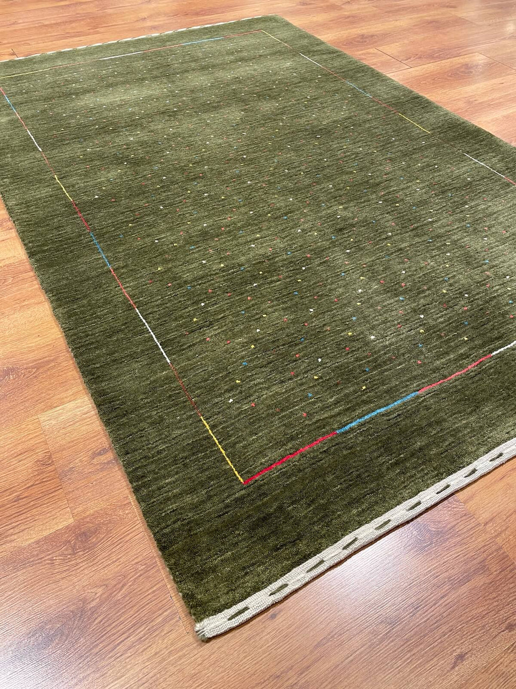 Lori Handwoven Green Wool Rug by Camel Carpet
