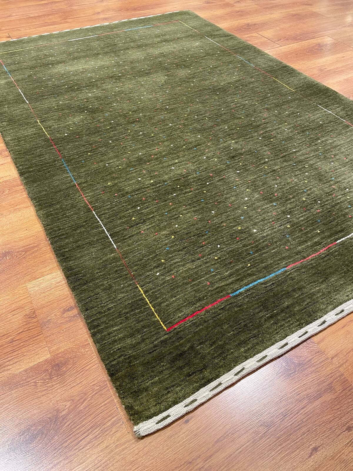 Lori Handwoven Green Wool Rug by Camel Carpet