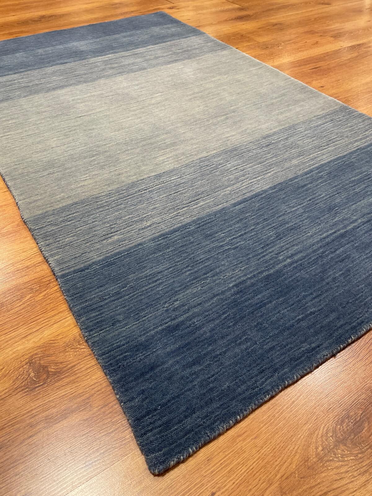 Lori Handwoven Cream Blue Wool Rug by Camel Carpet