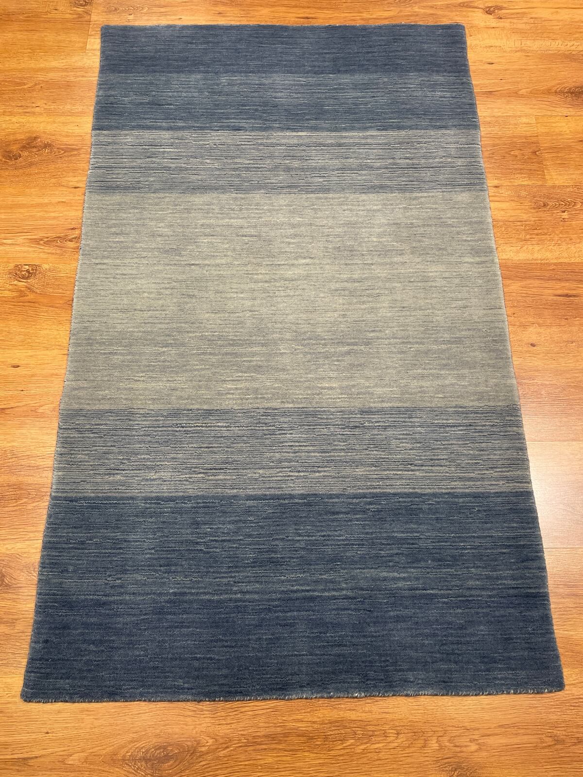 Lori Handwoven Cream Blue Wool Rug by Camel Carpet