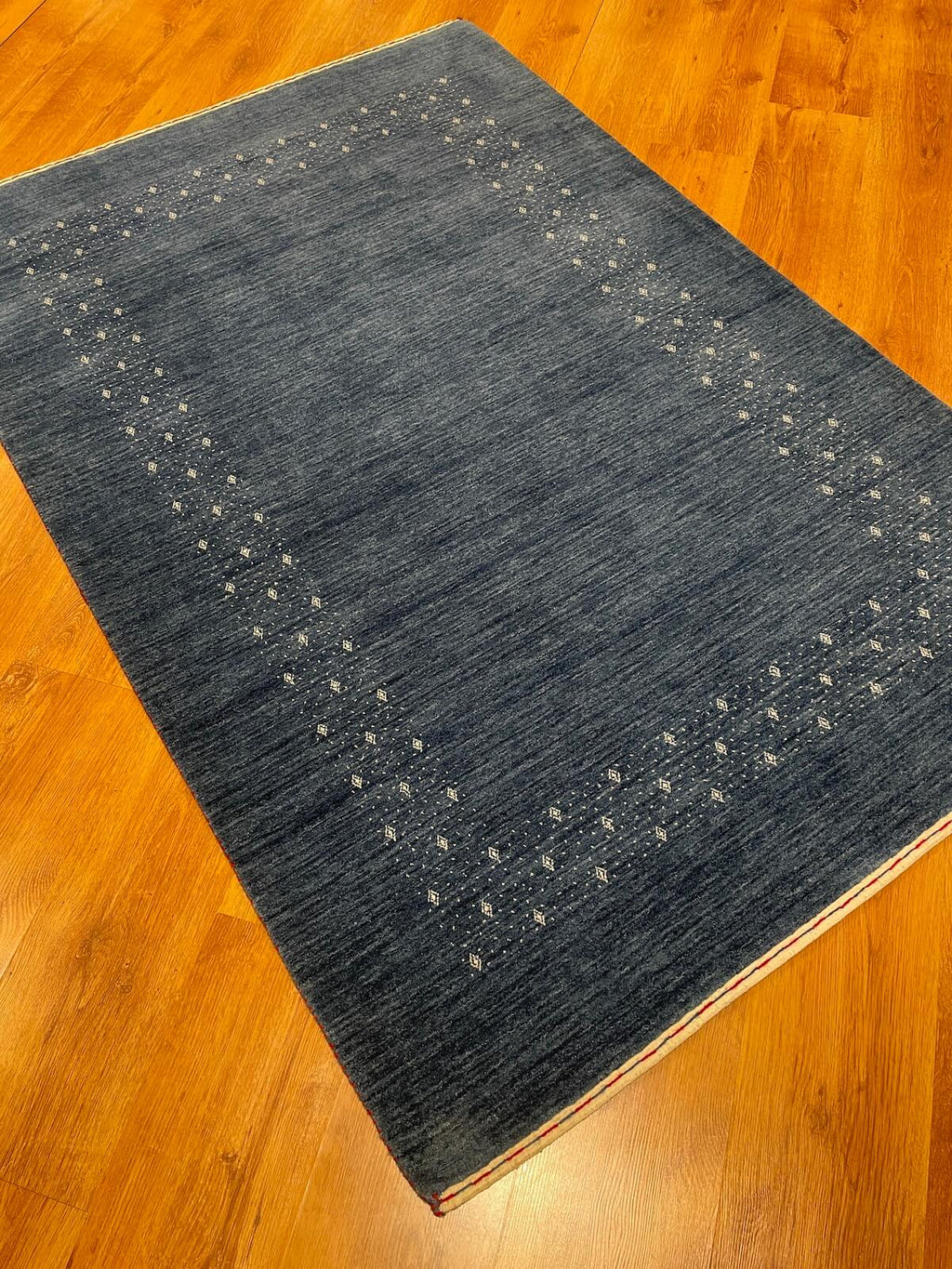 Lori Handwoven Blue Wool Rug – 122X178 by Camel Carpet