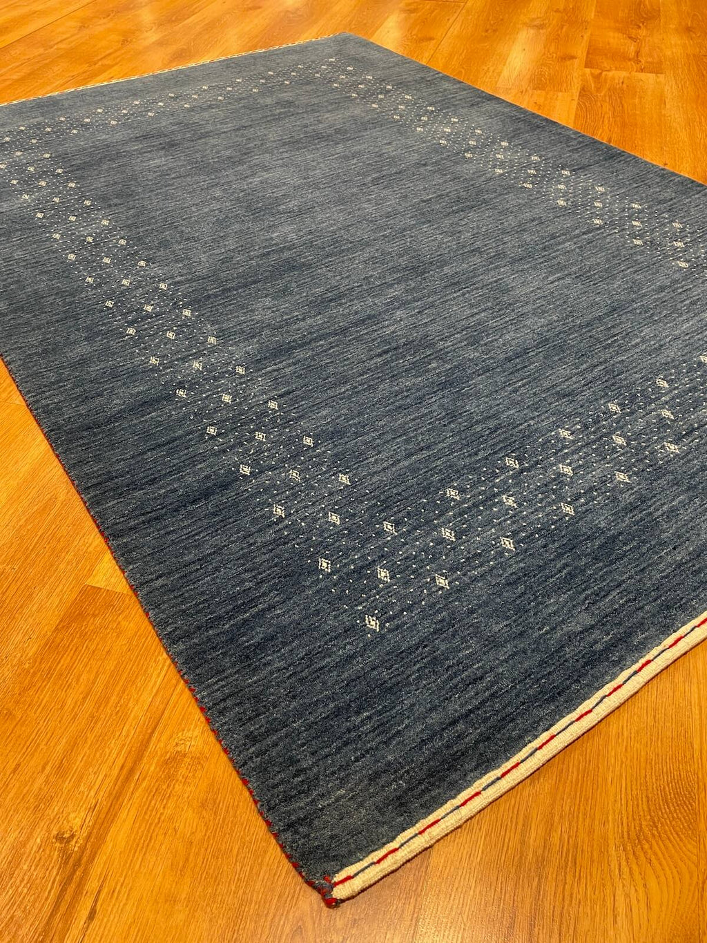Lori Handwoven Blue Wool Rug – 122X178 by Camel Carpet