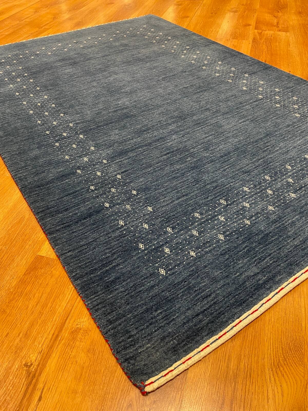 Lori Handwoven Blue Wool Rug – 122X178 by Camel Carpet