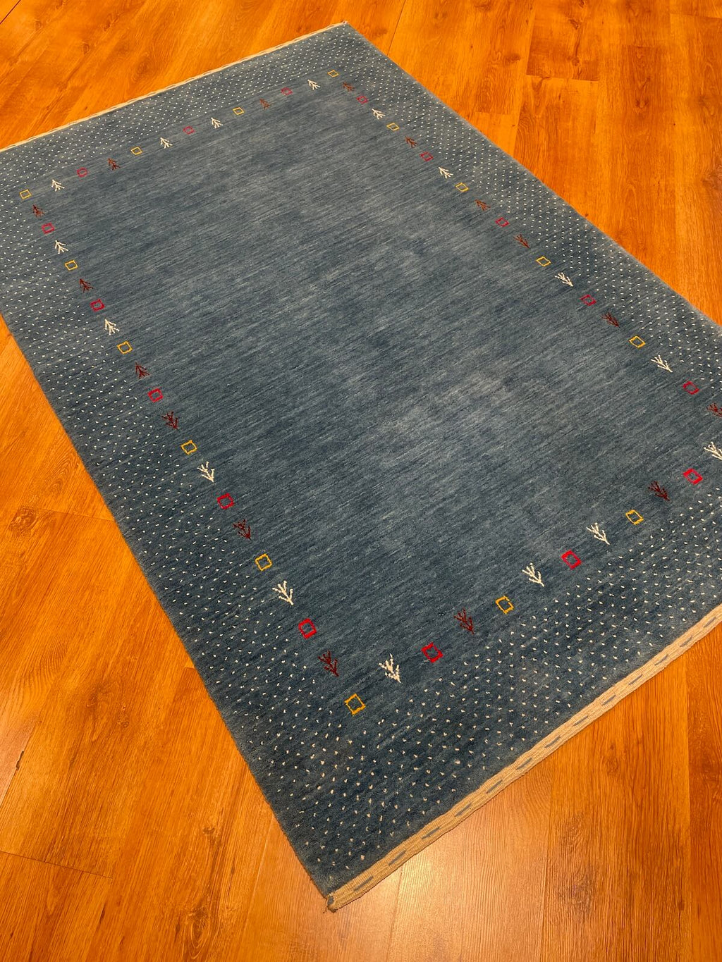 Lori Handwoven Blue Wool Rug – 122X184 by Camel Carpet