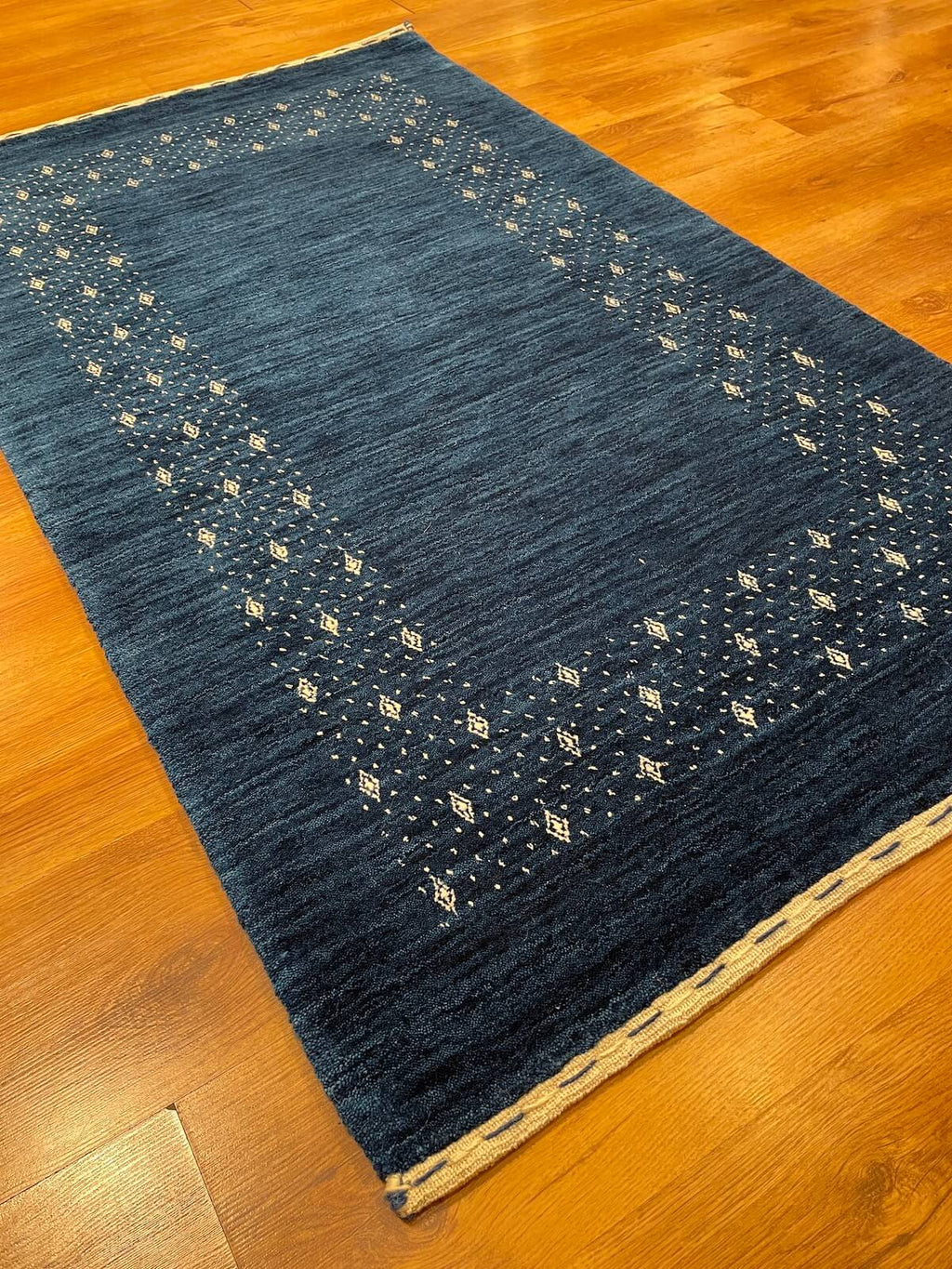 Lori Handwoven Navy Wool Rug – 90X150 by Camel Carpet