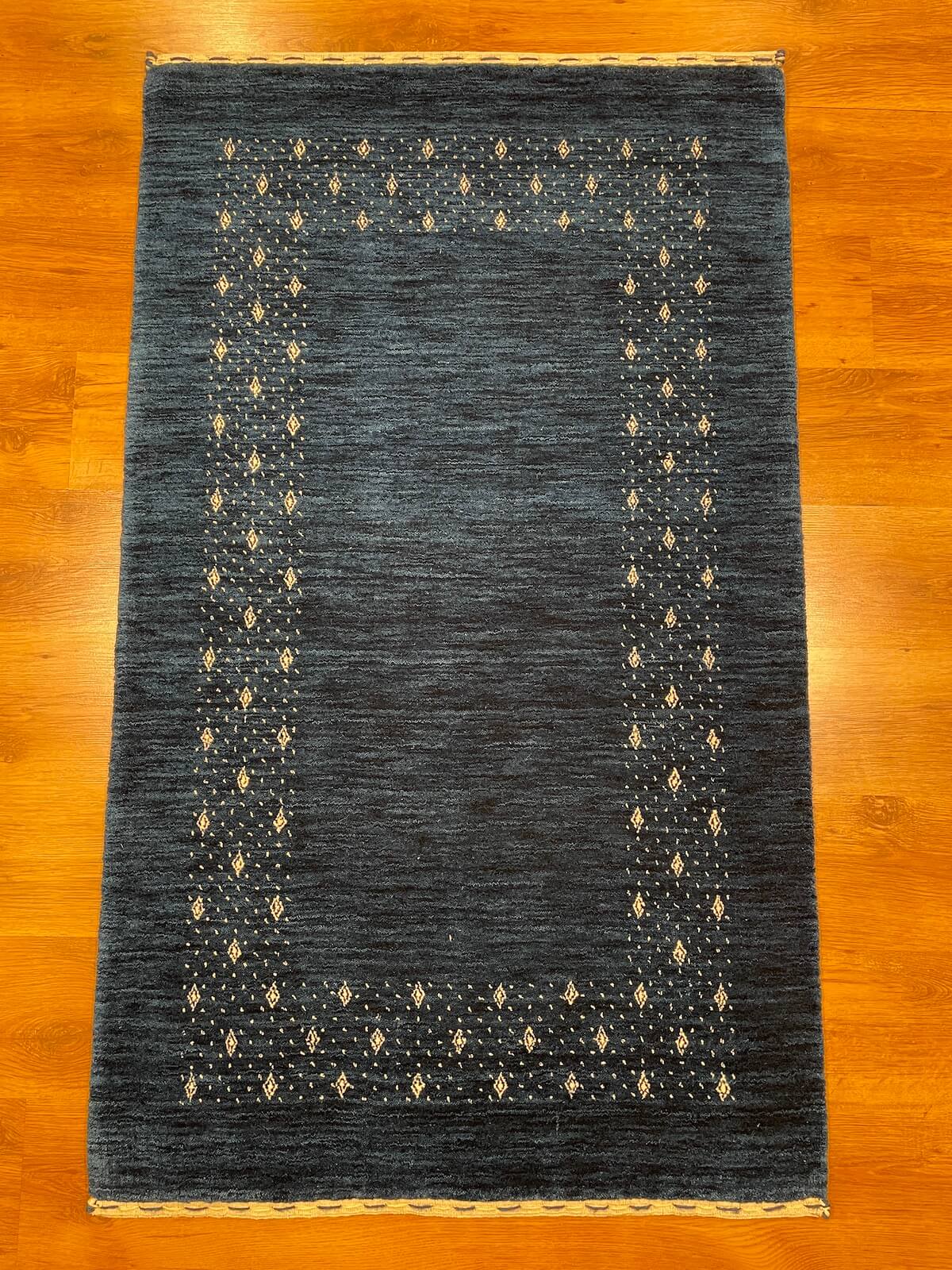 Lori Handwoven Navy Wool Rug – 90X150 by Camel Carpet
