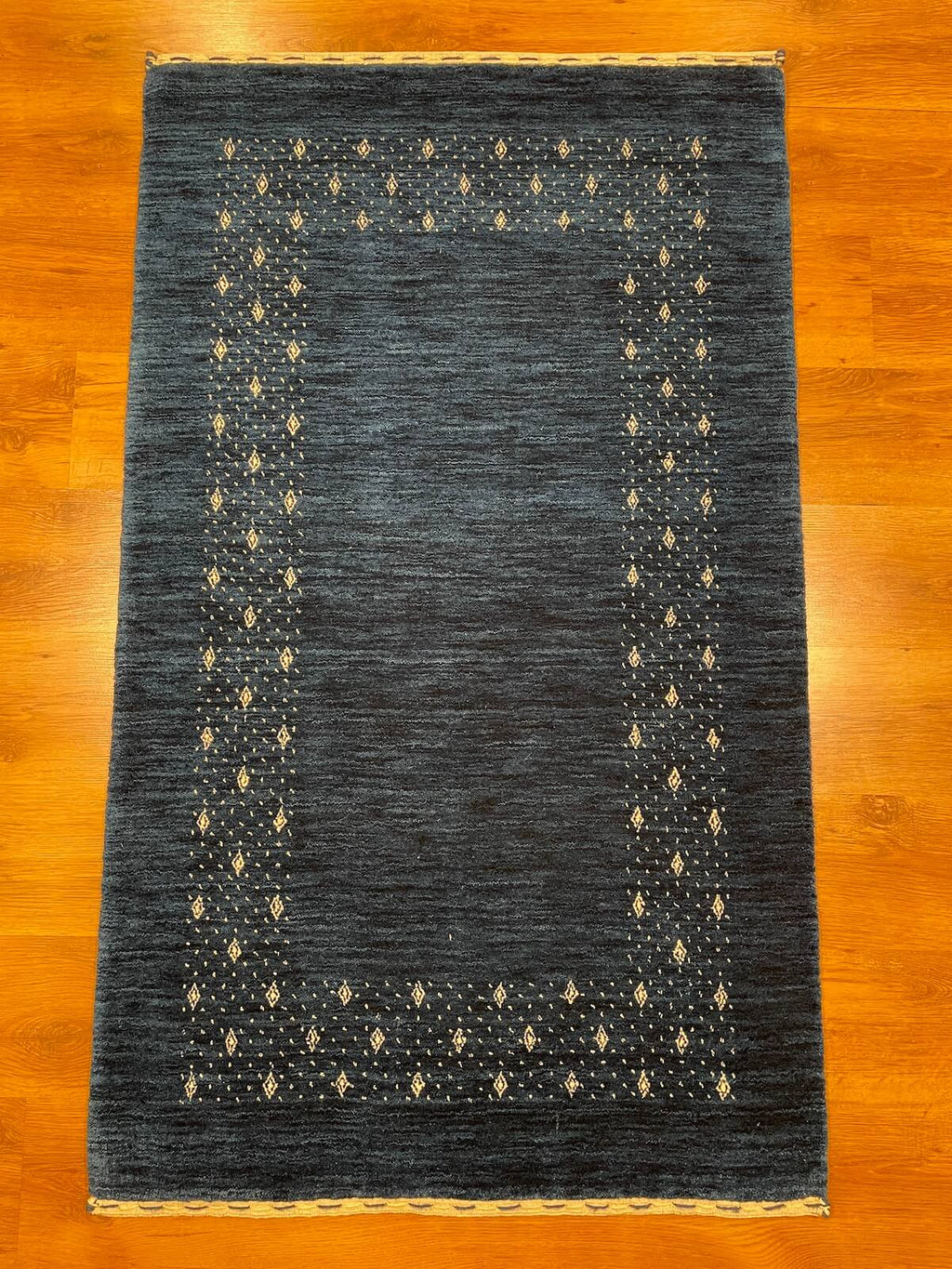 Lori Handwoven Navy Wool Rug – 90X150 by Camel Carpet