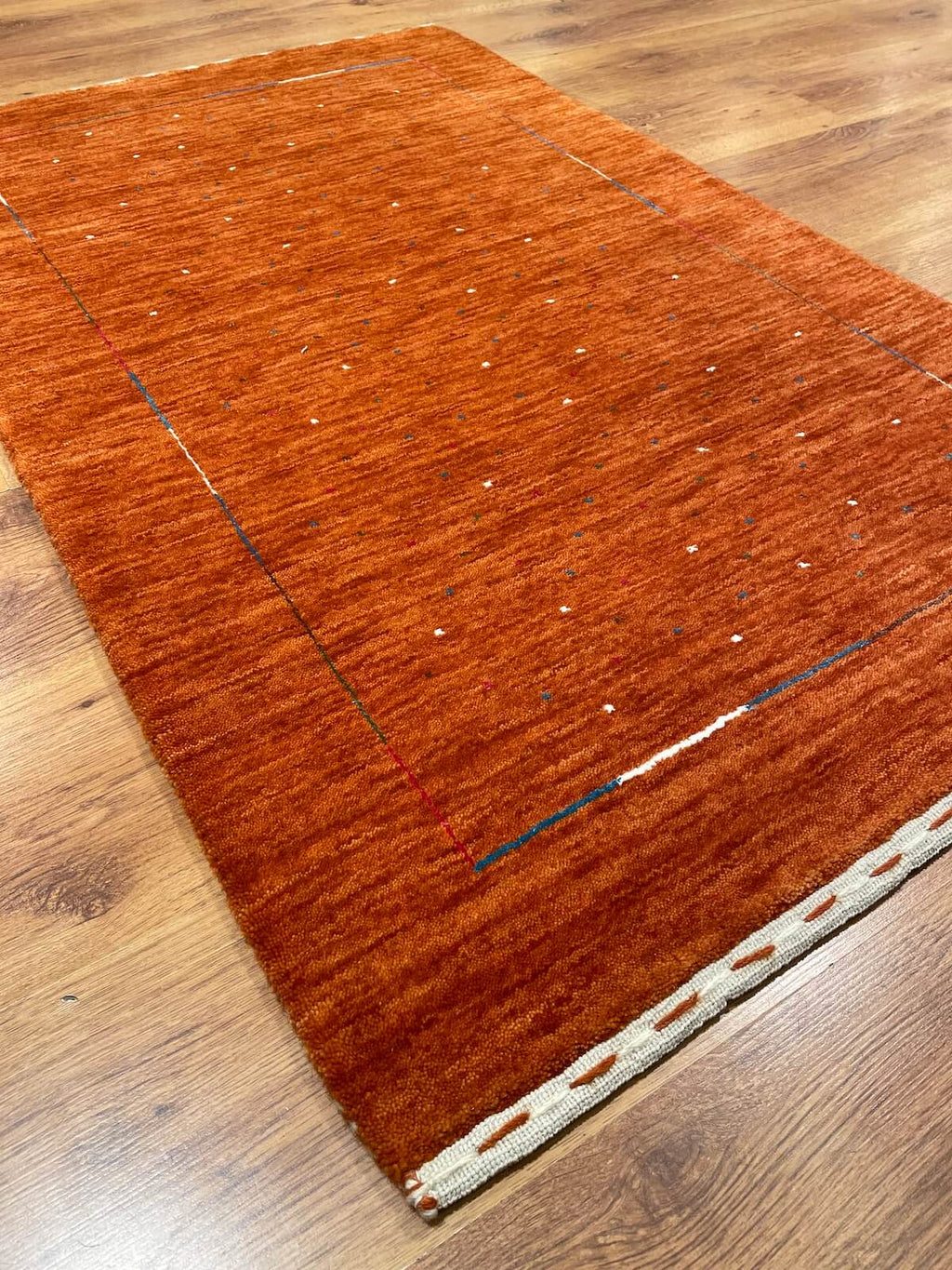 Lori Handwoven Orange Wool Rug by Camel Carpet