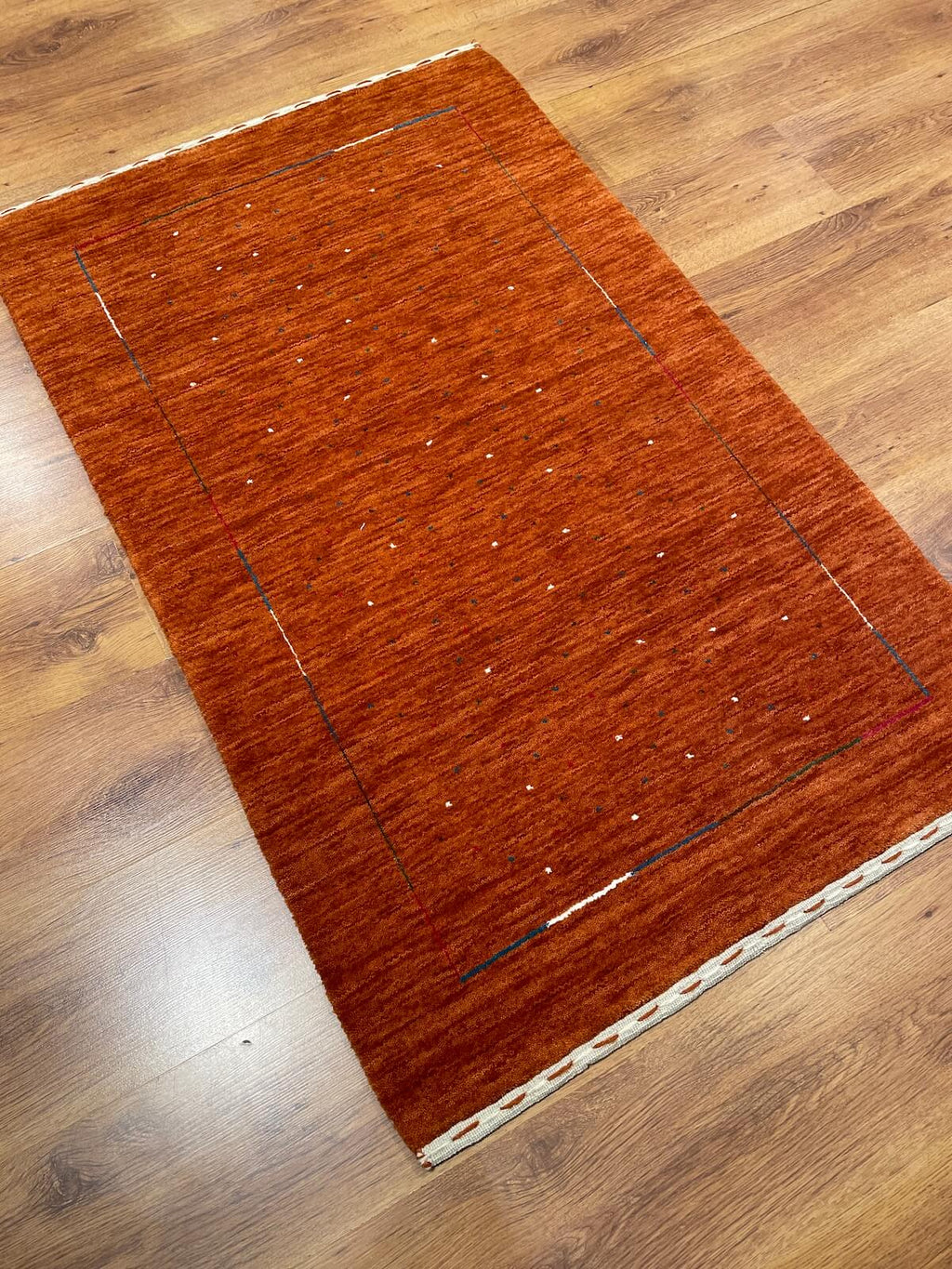 Lori Handwoven Orange Wool Rug by Camel Carpet