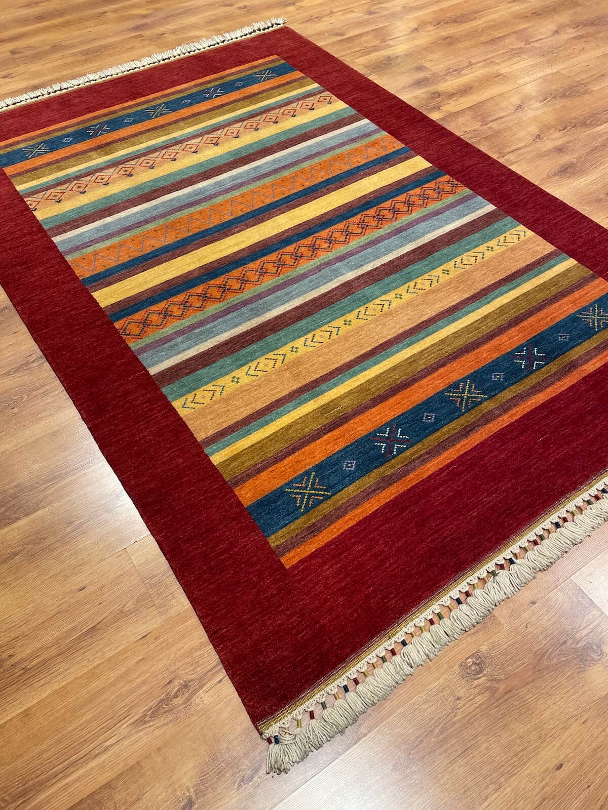 Tribal Handwoven Red Wool Rug – 168X242 by Camel Carpet