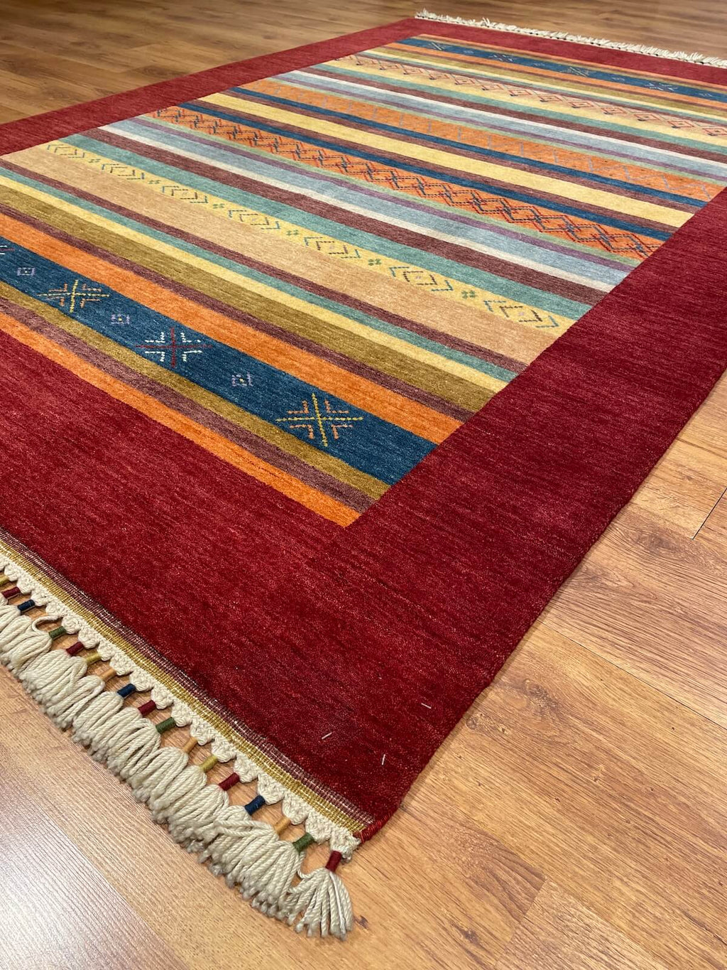 Tribal Handwoven Red Wool Rug – 168X242 by Camel Carpet