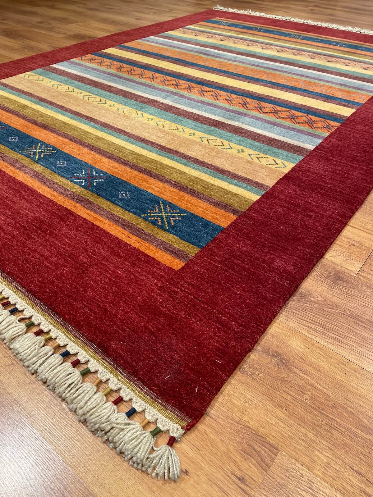 Tribal Handwoven Red Wool Rug – 168X242 by Camel Carpet